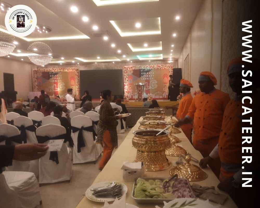 Corporate catering setup at seminar event with stage and chairs
