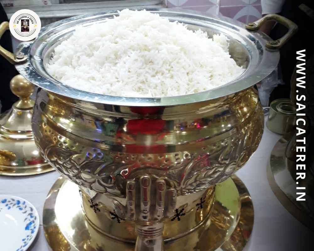 Clean basmati rice served in annaprashan catering buffet setup