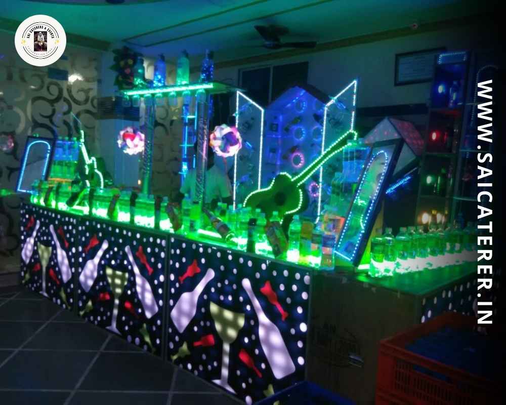 Mocktail counter with green lighting and drinks preparation