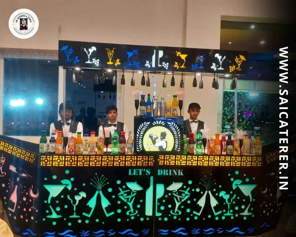 Staff preparing mocktails at decorated catering counter