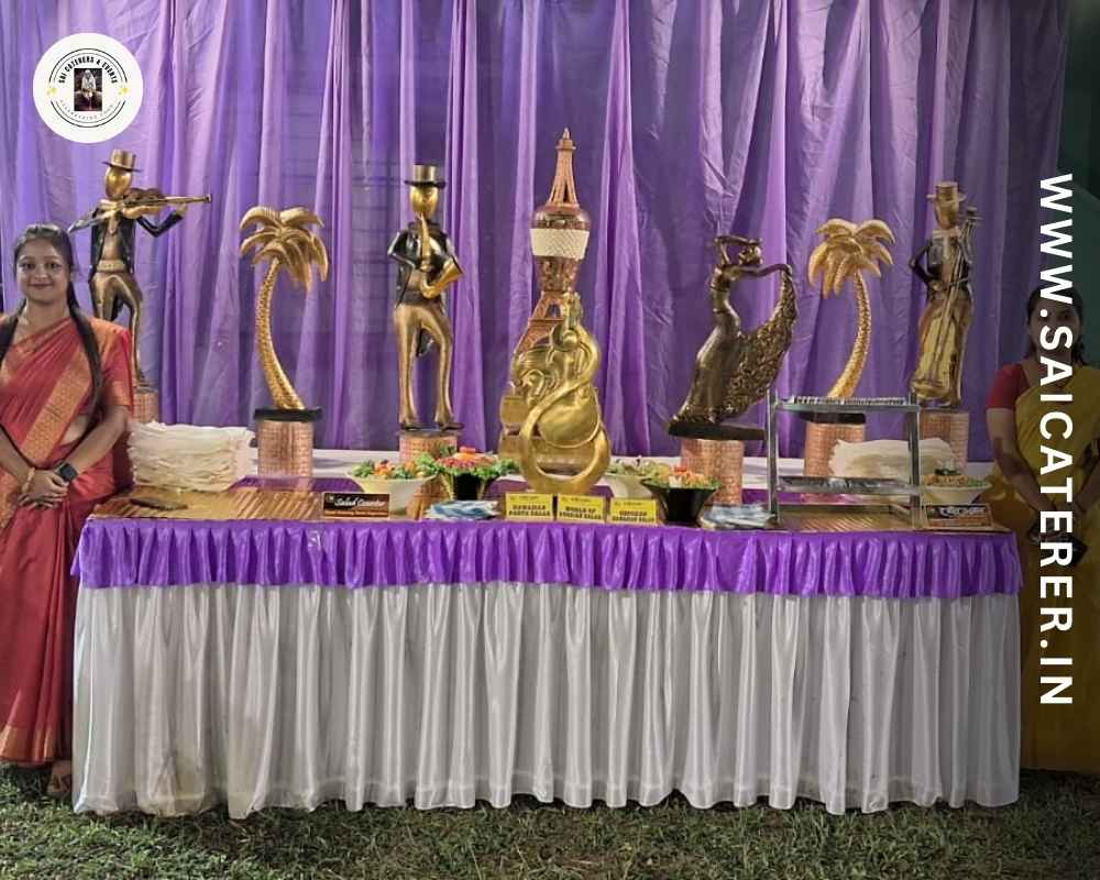Outdoor catering plate counter with staff and beautiful decoration