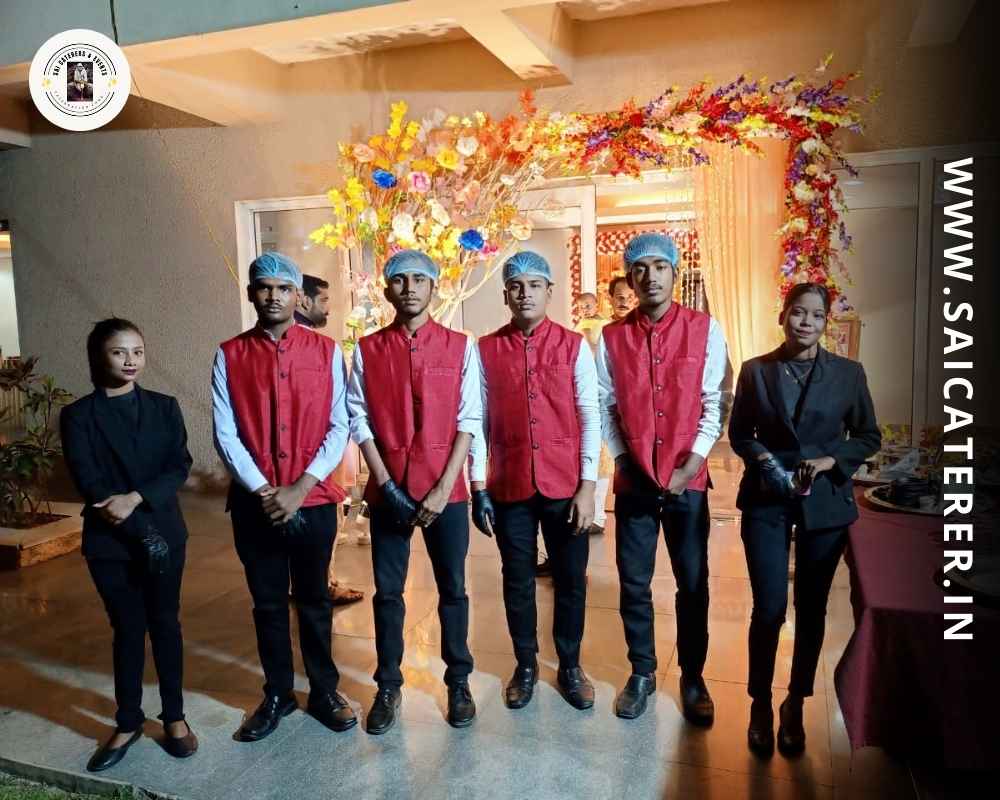 Sai Caterer staff lineup in uniform with hygiene standards