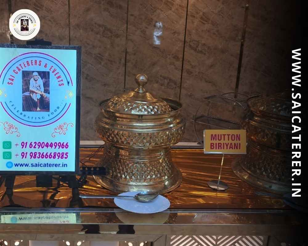 Reception catering buffet serving mutton with Sai Caterer branding